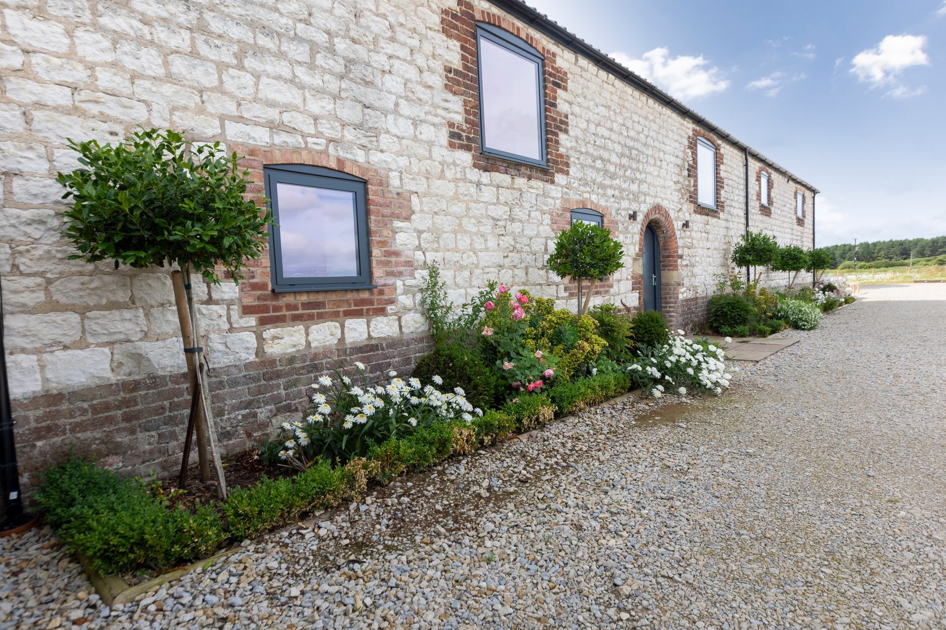 There is a pool table in the middle of the room.