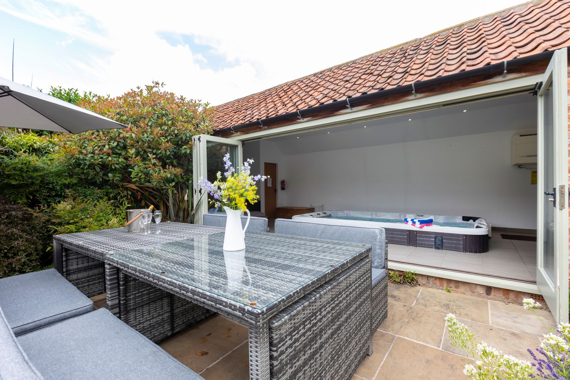 A large kitchen with a large island and stools