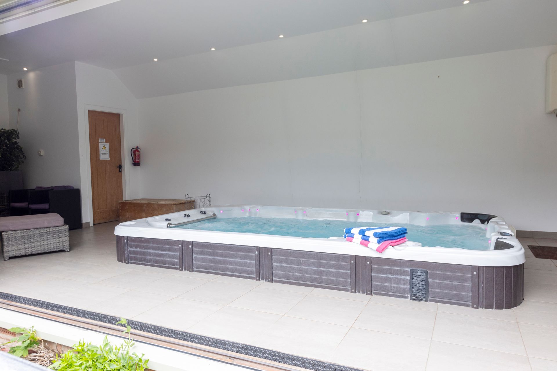 A large kitchen with a large island and stools