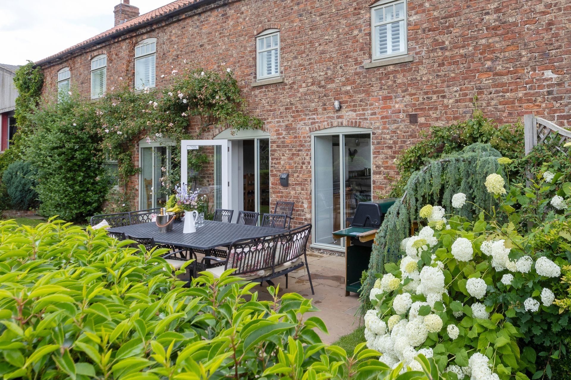 There is a pool table in the middle of the room.