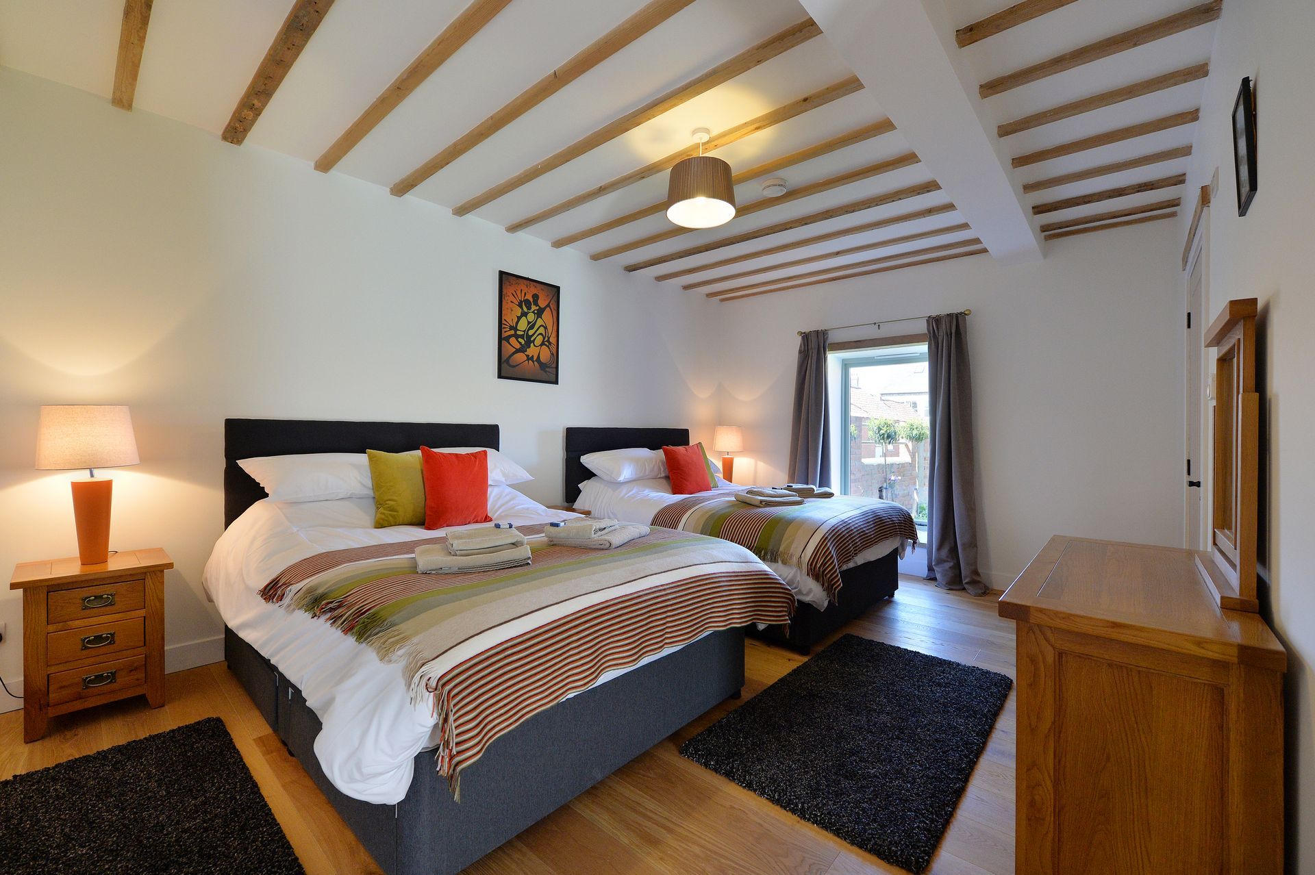 There is a large bed in the middle of the room.