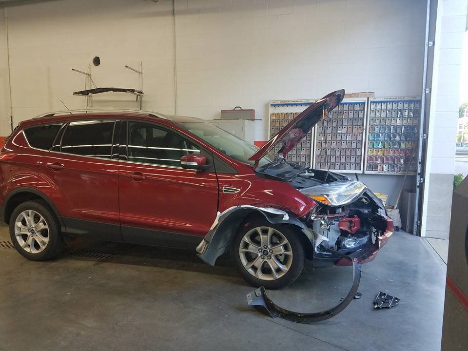 Damaged Car — Canton, OH — Aman's Collision Center Inc