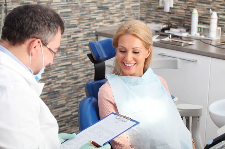 Dentist checking the result - Family dentistry in Mount Holly, NJ