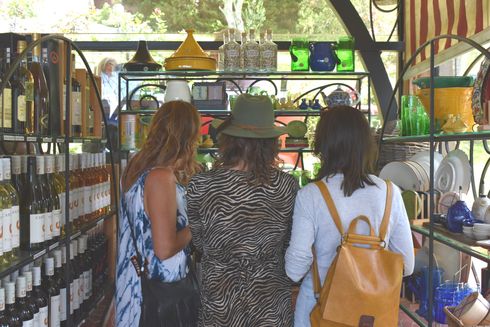 Three woman enjoying the gift shop at Casita Miro