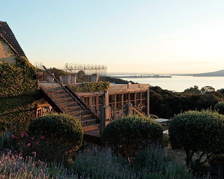 Mudbrick Winery balcony and view of Auckland in the distance