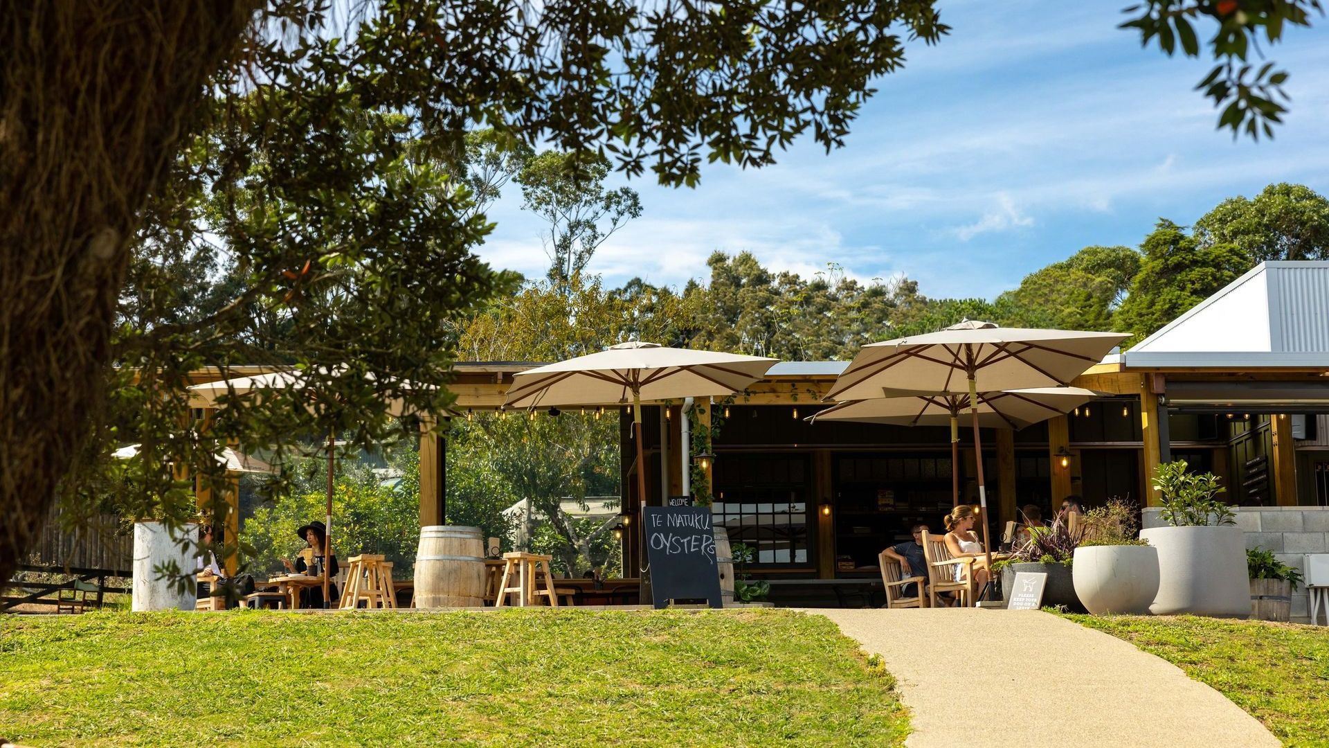 The Heke Restaurant entrance with tables