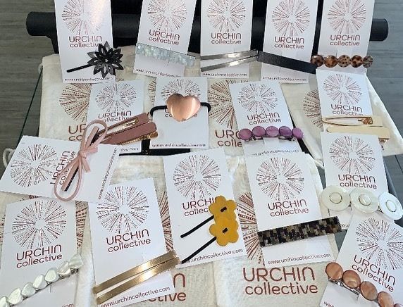 Hair Accessories Displayed on A Table — EDISON Hair Collective In Mackay, QLD