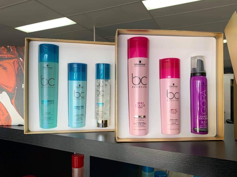 Hair Product Gift Sets Displayed on A Shelf — EDISON Hair Collective In Mackay, QLD