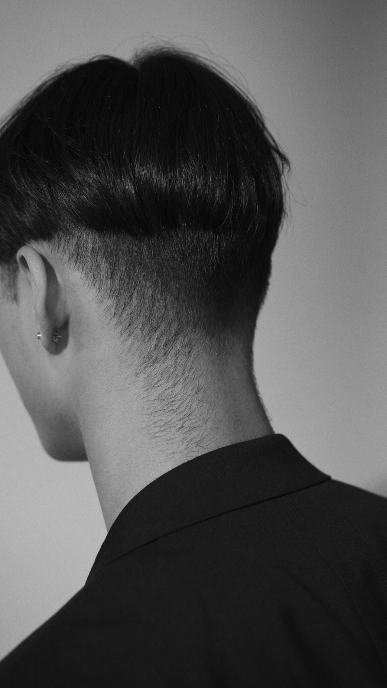 Man With a Short Haircut, Shaved Sides, and a Black Jacket — EDISON Hair Collective In Mackay, QLD
