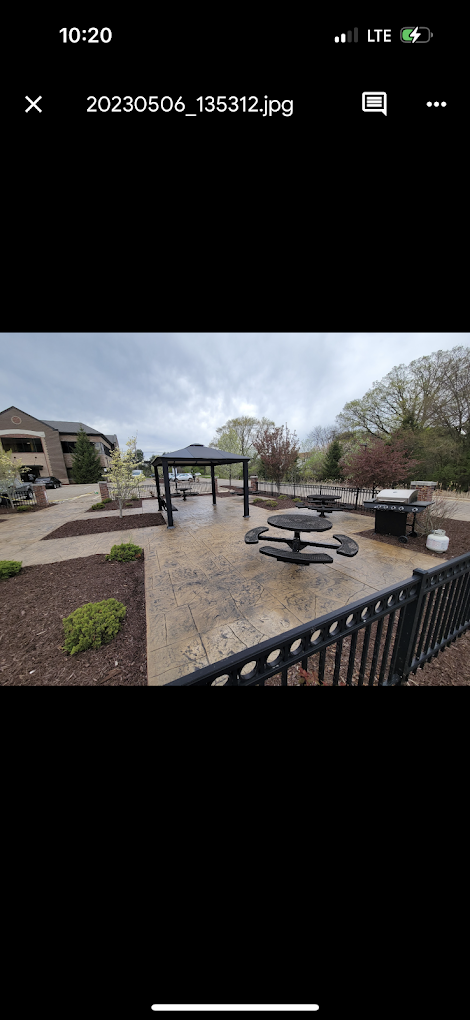 A picture of a picnic area on a cell phone.