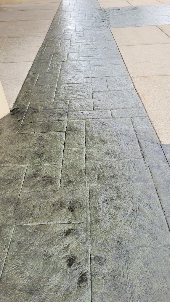 A close up of a tiled floor in a building.