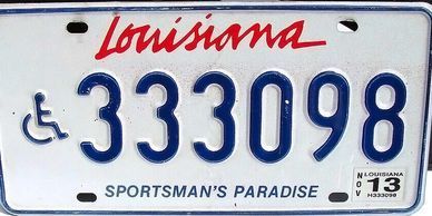 Louisiana license plate with wheelchair symbol and the numbers 333098, 