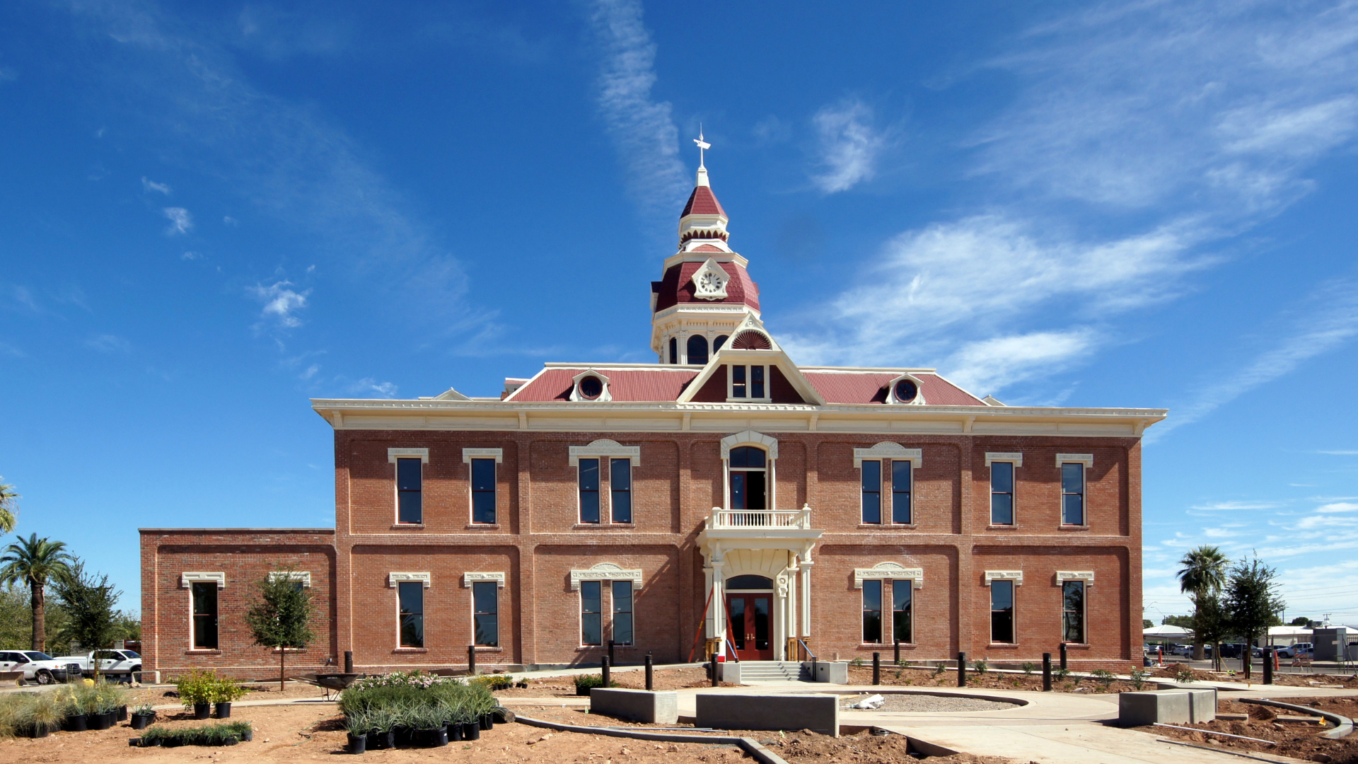 A large brick building with a clock tower on top