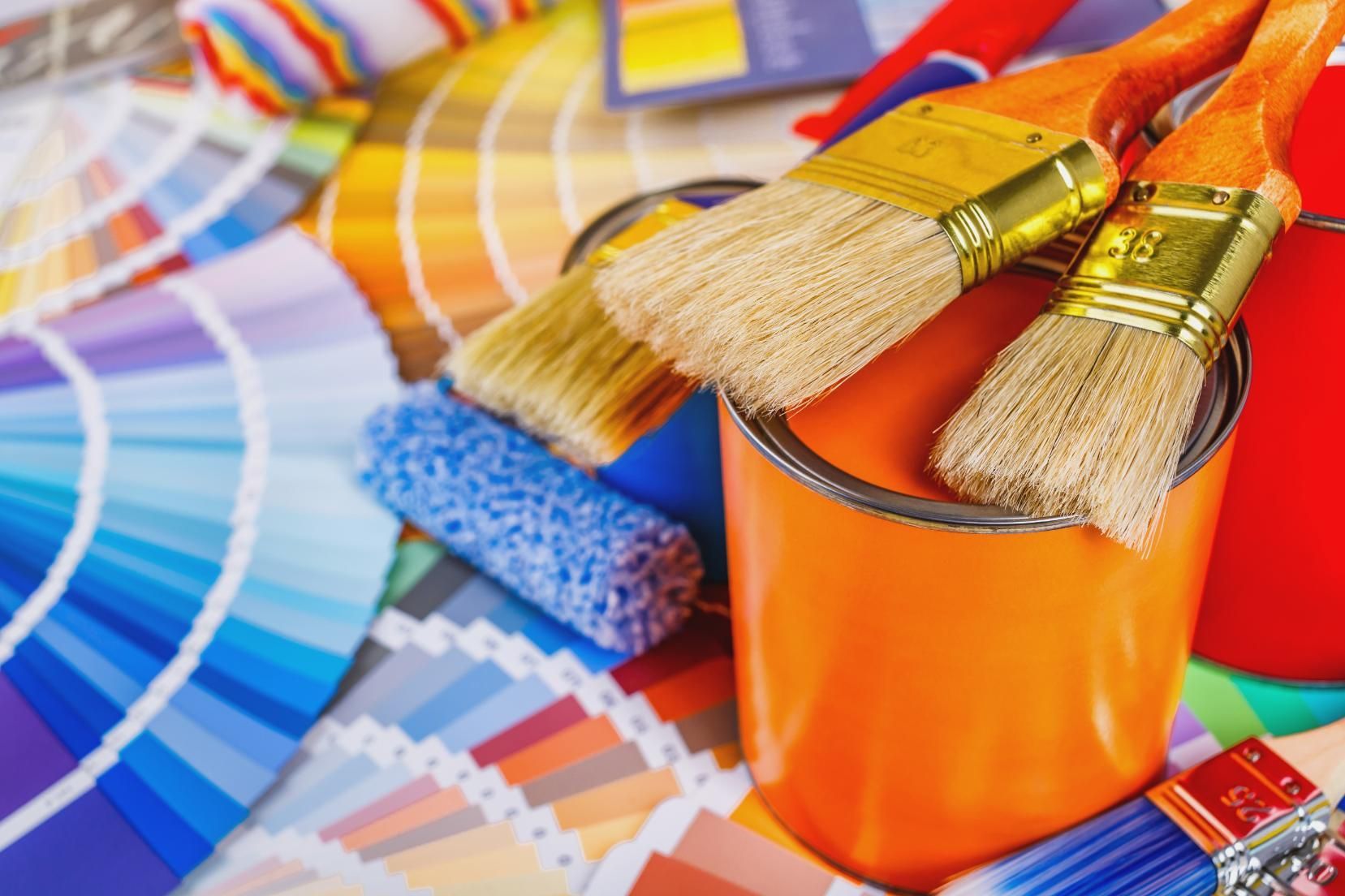 Paintbrushes, roller, and paint can, with color swatches.