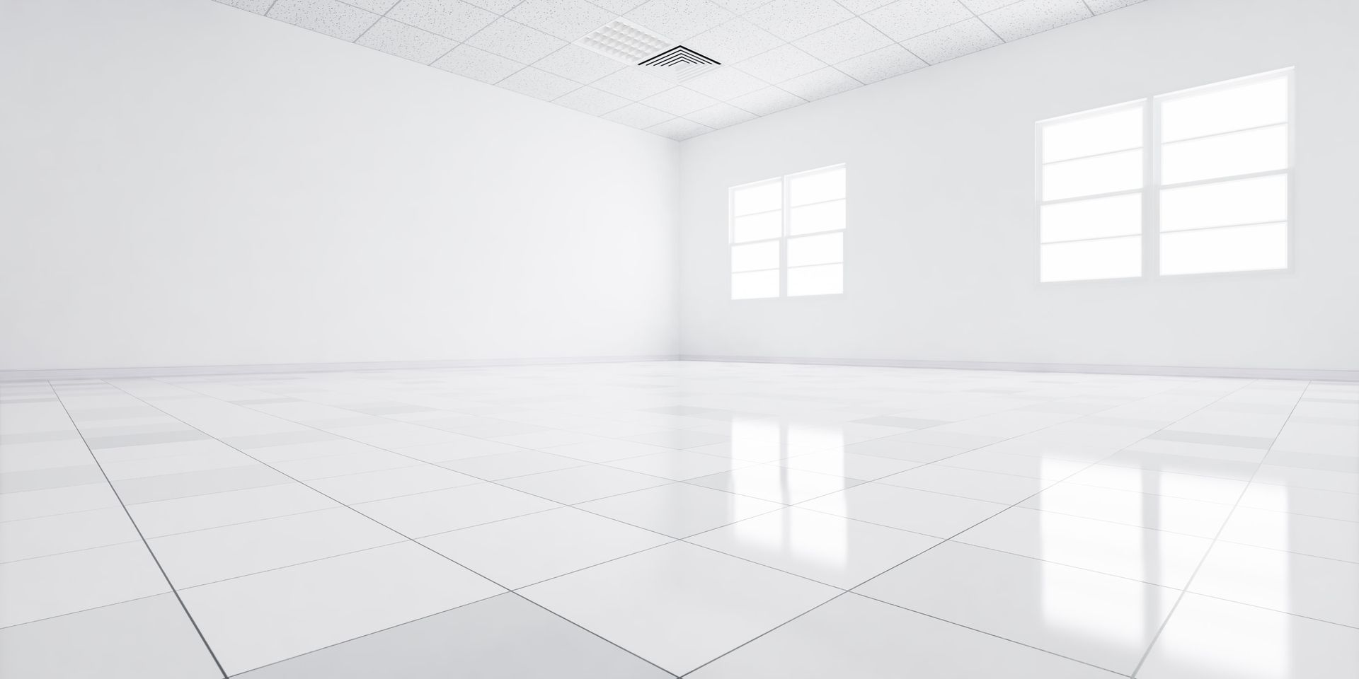 Bright, empty white room with large windows reflecting on the glossy tiled floor.