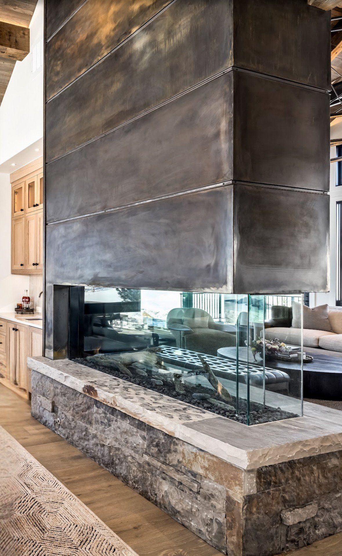 There is a fireplace in the middle of the room.