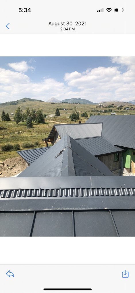 A picture of a roof with a bird fence on it.