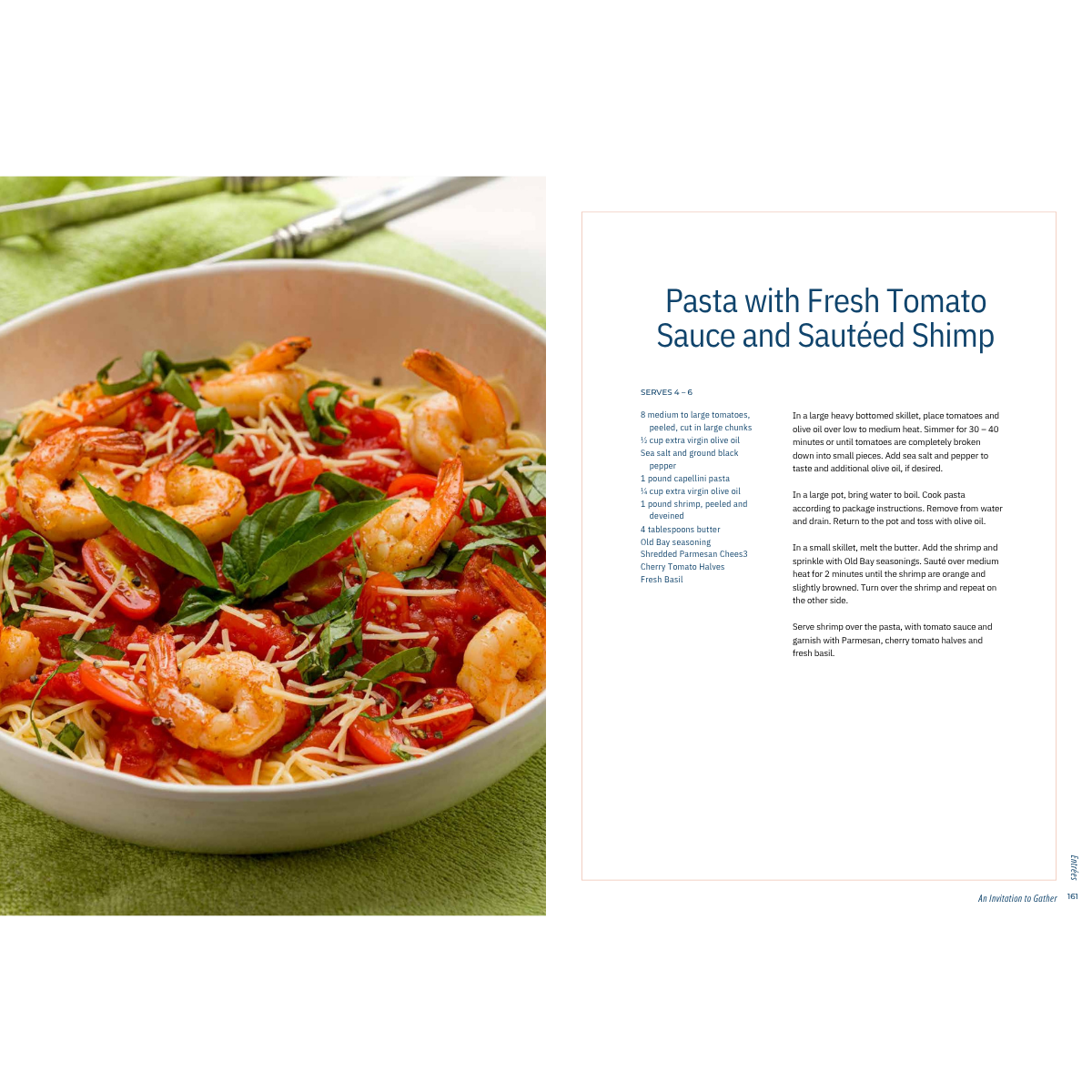 Bowl of pasta with fresh tomato sauce and sautéed shrimp beside a recipe page