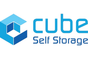 A logo for cube self storage with a blue cube