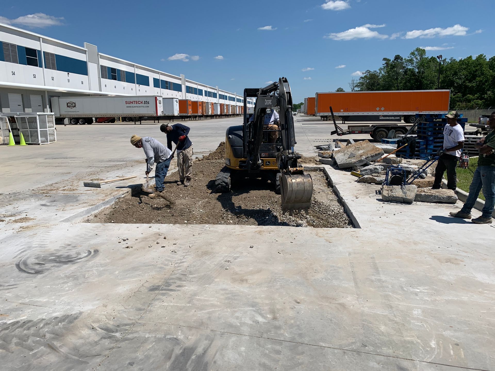 A group of construction workers are working on a construction site