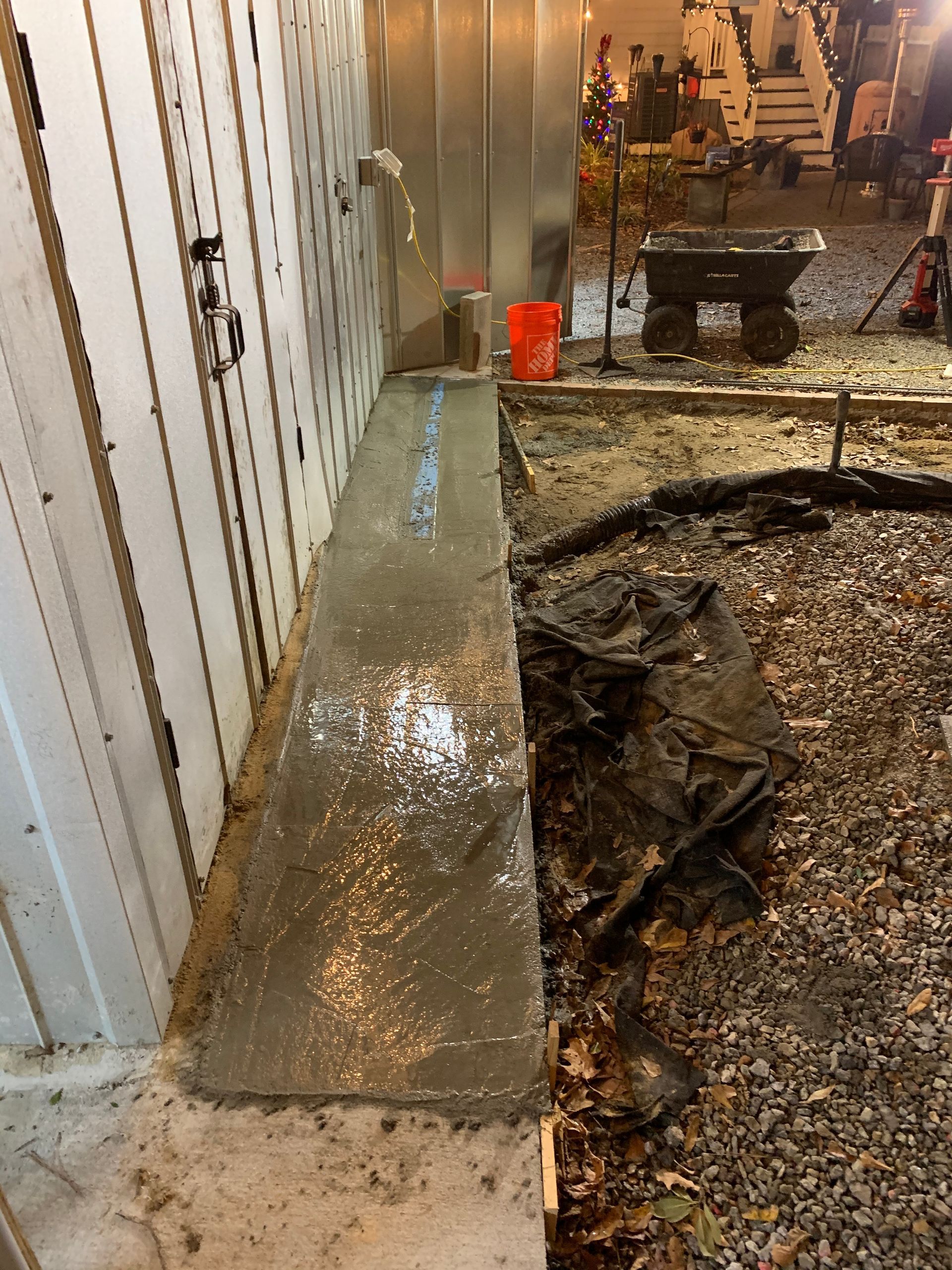 A concrete wall is being built in a garage.