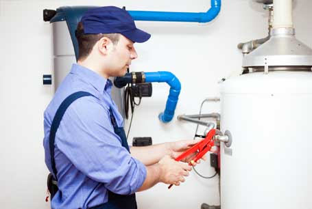 Plumber Fixing the Water Heater — Boca Raton, FL — Boca Certified Plumbing