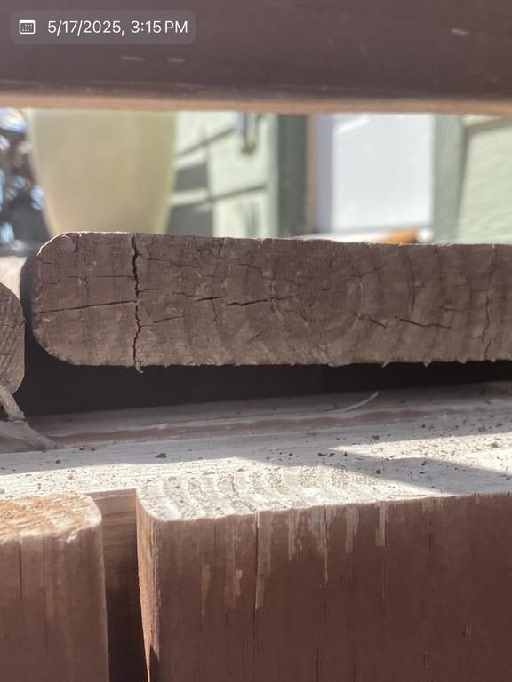 A close up of a piece of wood with a time stamp of 3:15 pm