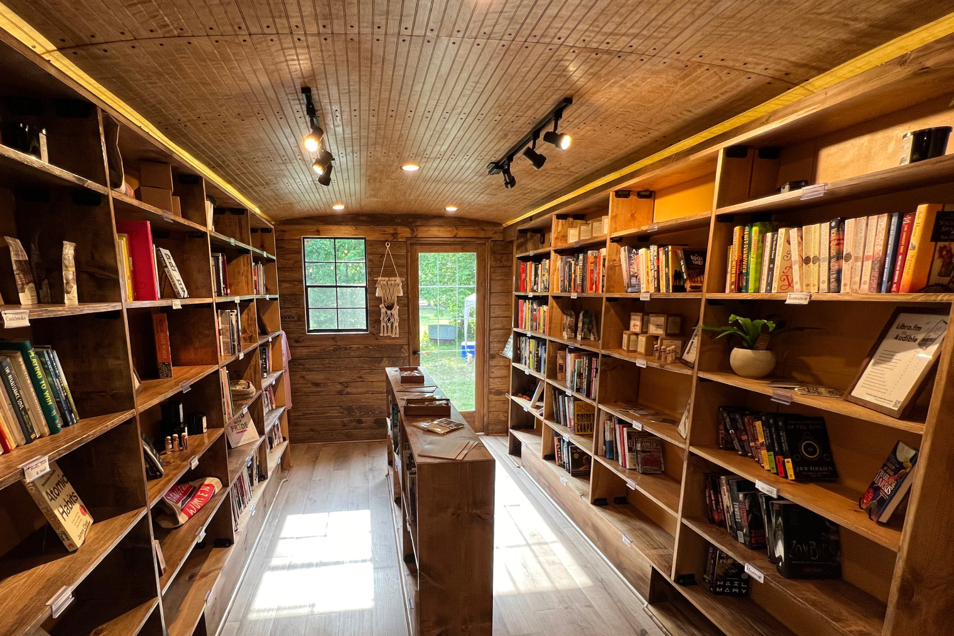 Shelves filled with books inside of a mobile bookstore