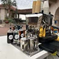 A coffee cart in an outside courtyard