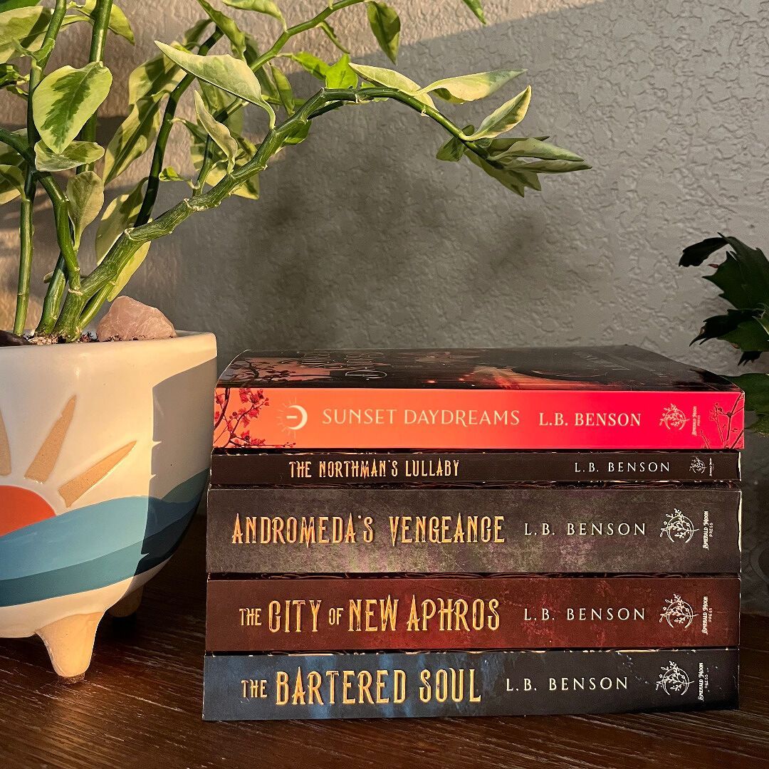 Stack of books with titles: