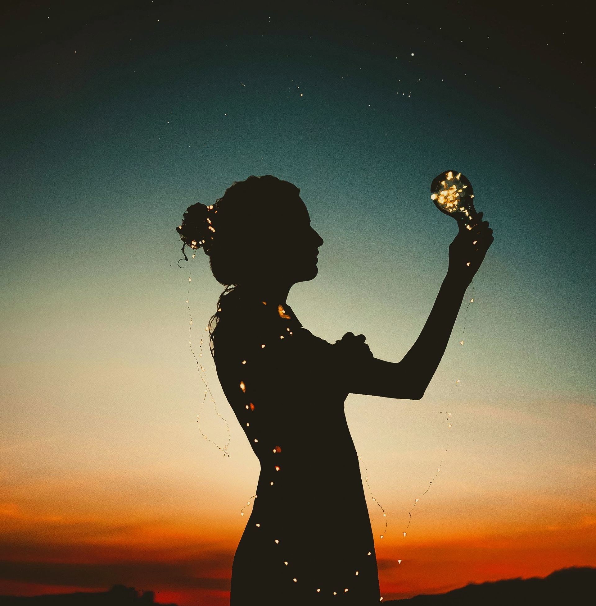 Girl in sunset image illustrating Bearing 45 Compass Session