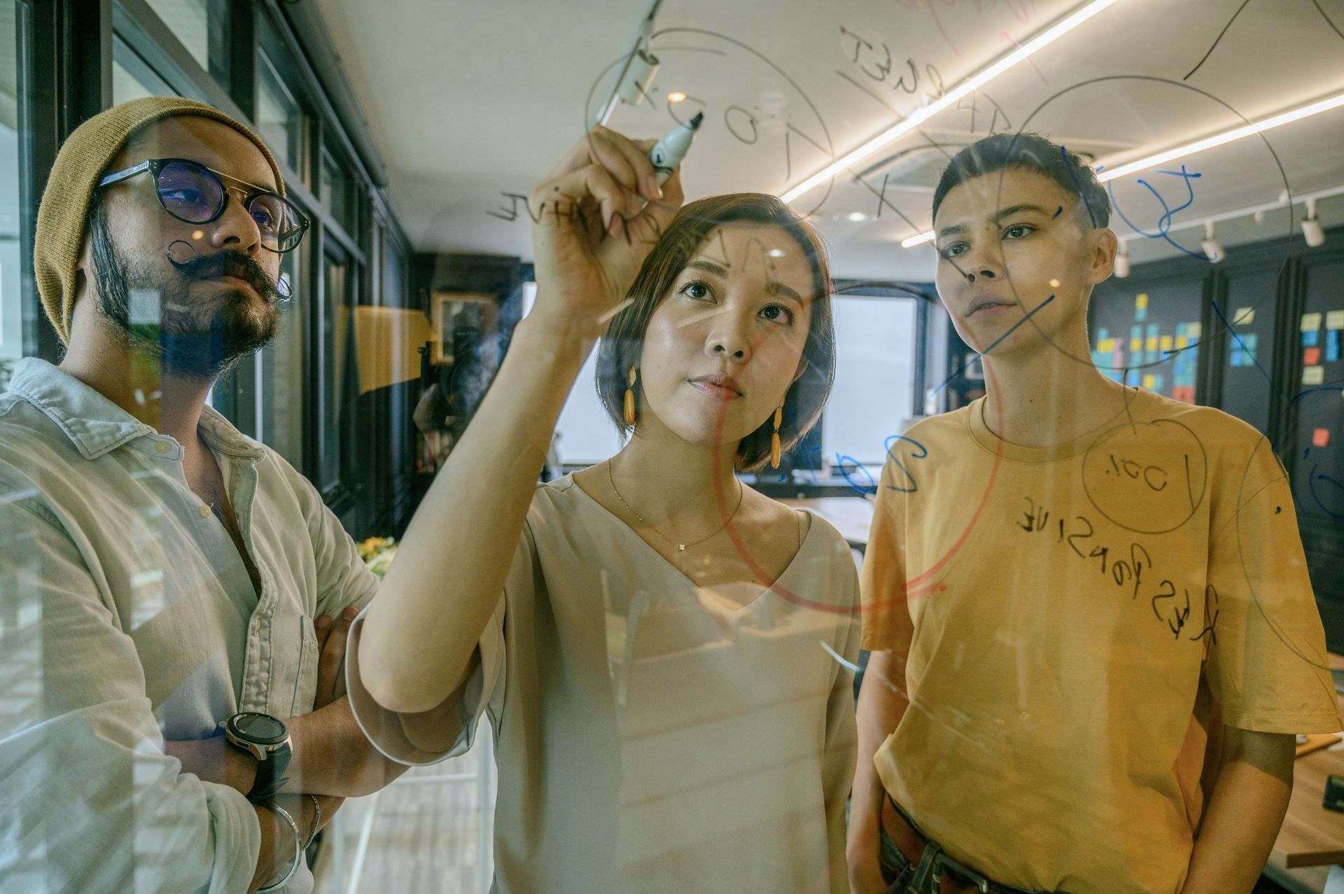 Image of people preparing a meeting, used to illustrate Bearing 45s service Managed Business Partner Program.
