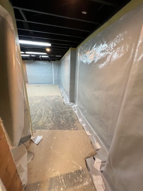 A room with a lot of plastic on the walls and floor.