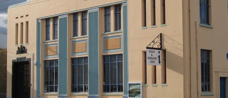 A large building with a clock on the side of it