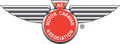 A logo for the nz motor caravan association