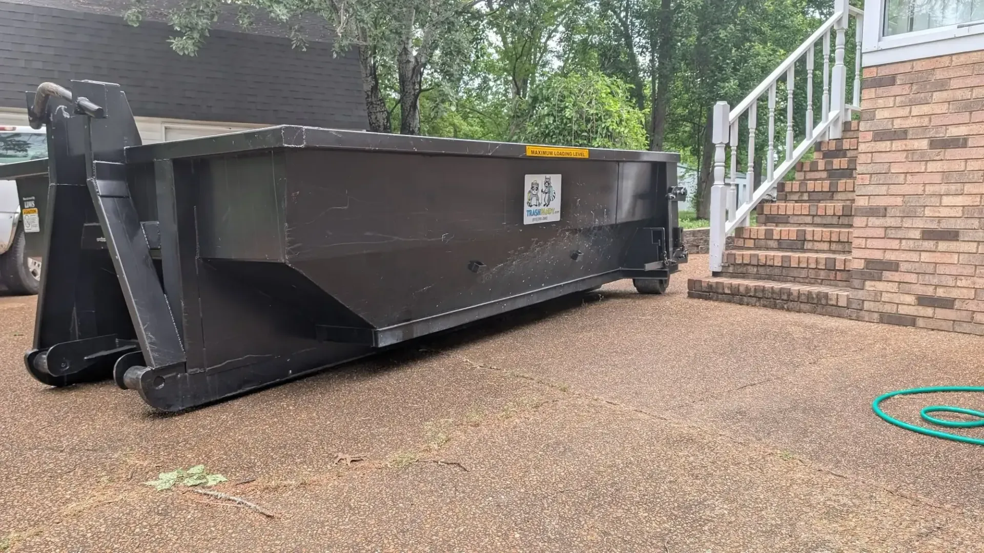 Trash Pandy 10 yard roll-off dumpster placed at a residential home in Middle Tennessee