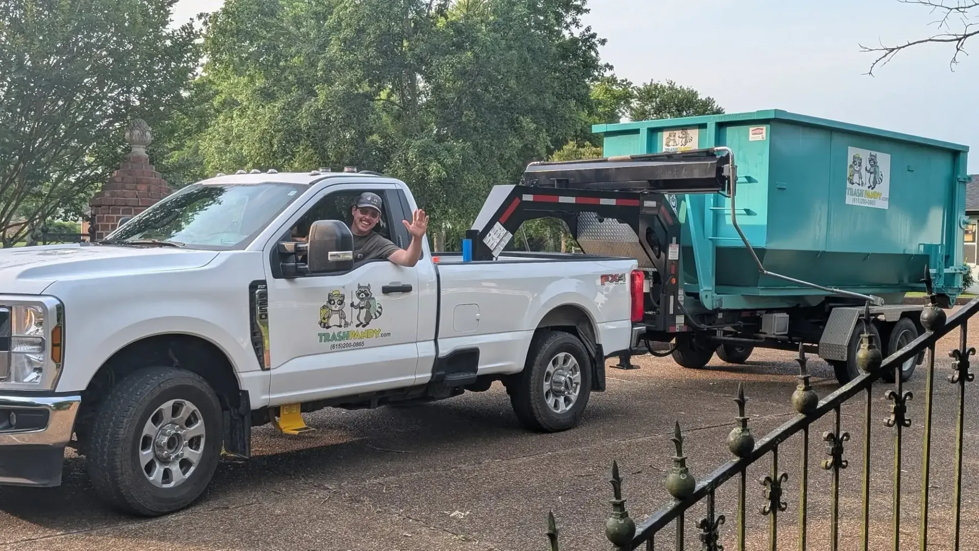 William Shackelford of Trash Pandy LLC delivering a roll-off dumpster in Murfreesboro, Tennessee