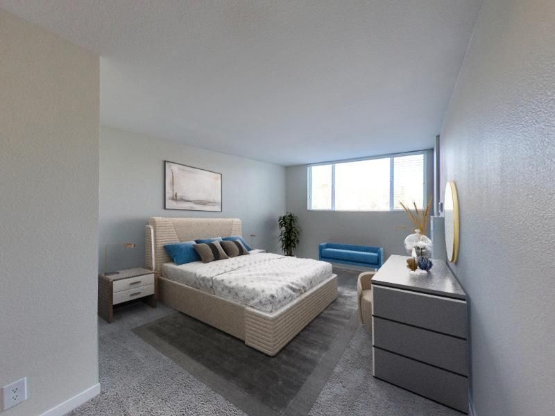 modern living room with a sofa, coffee table, bench, chair, tv and onlooking to a patio