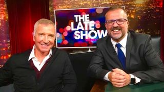 Ewen Cameron sits with football legend Graeme Souness on the set of Ewen's STV2 late night chat show The Late Show