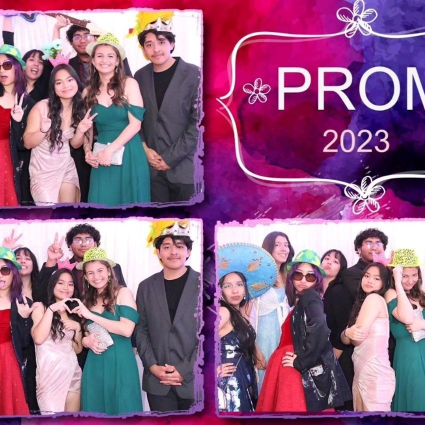 A group of people are posing for a prom photo