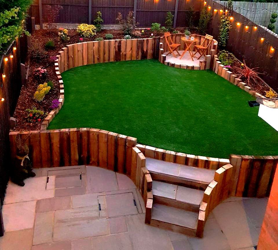 Garden Design and Install Wolverhampton. Garden Makeover using sleepers Artificial Grass Lighting and Indian Sandstone Paving