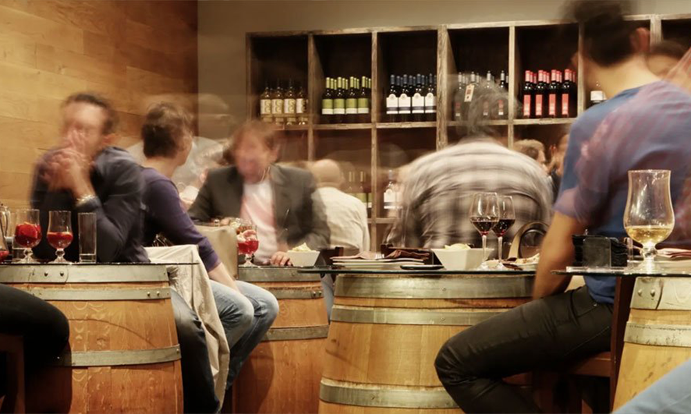 Group of people sitting at tables during Wine Tasting with Cable Car Wine Tours