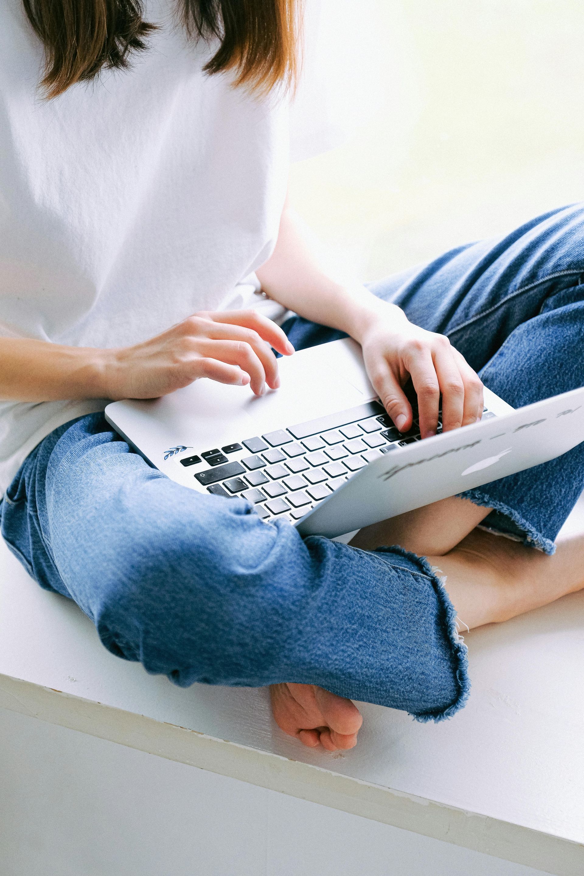 Woman , using a laptop for Requesting Public Records in New Mexico