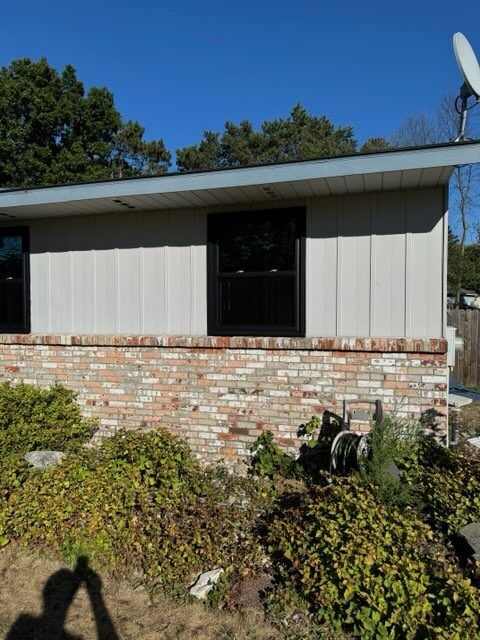 A house with a satellite dish on top of it