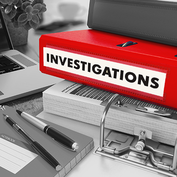 Red binder labeled