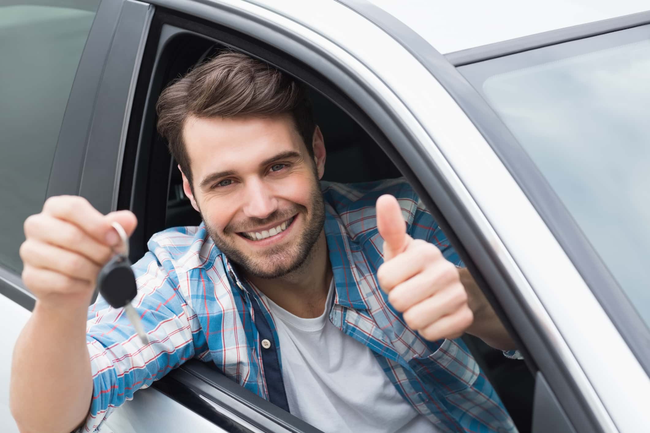 keys being inserted into car door