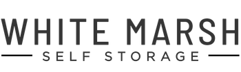 The logo for tower mini storage is black and white.