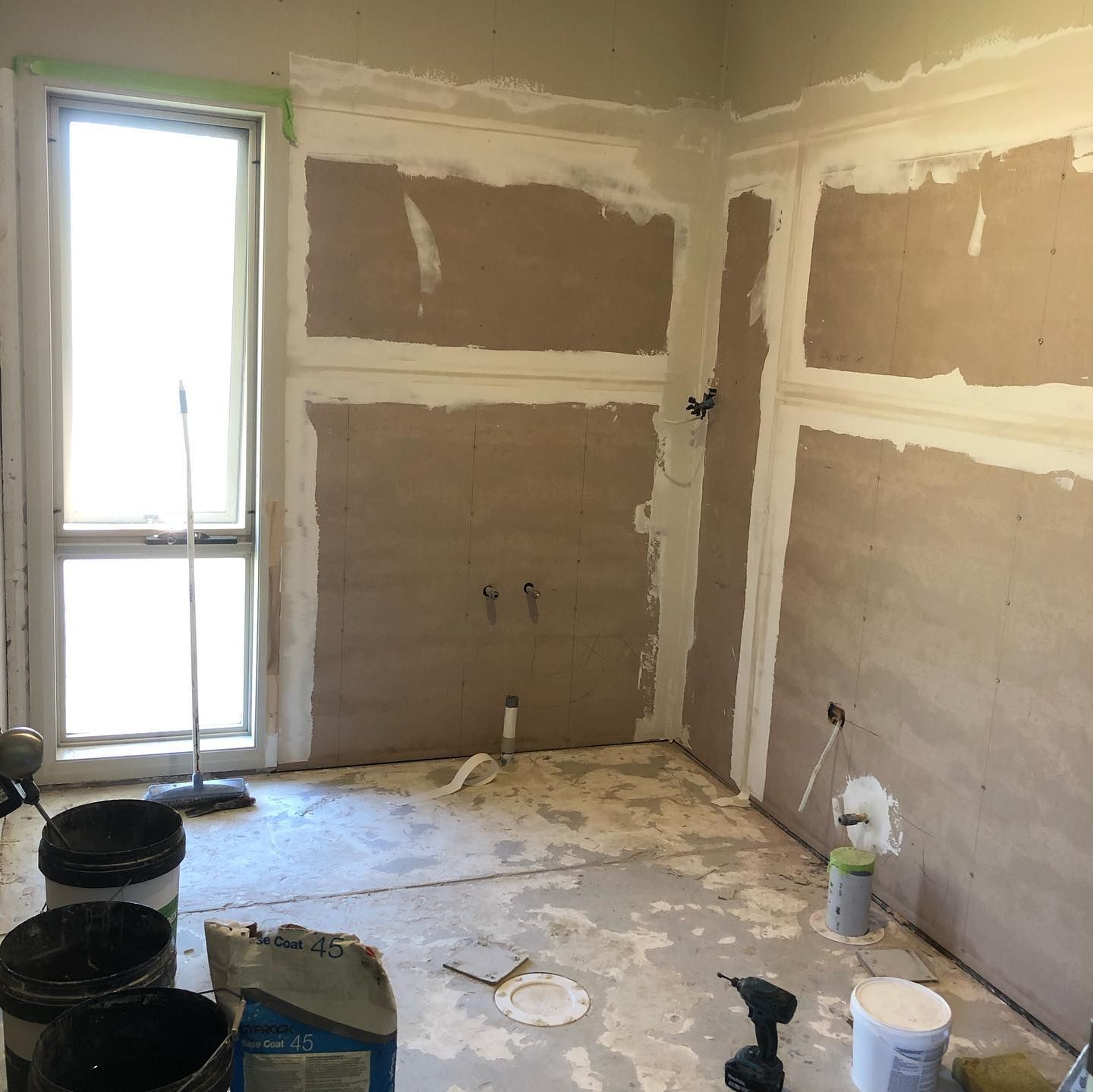 Walls With Plaster, Plumbing Fixtures, Buckets, Tools, and a Window — JNR Building And Maintenance in Green Hill, QLD