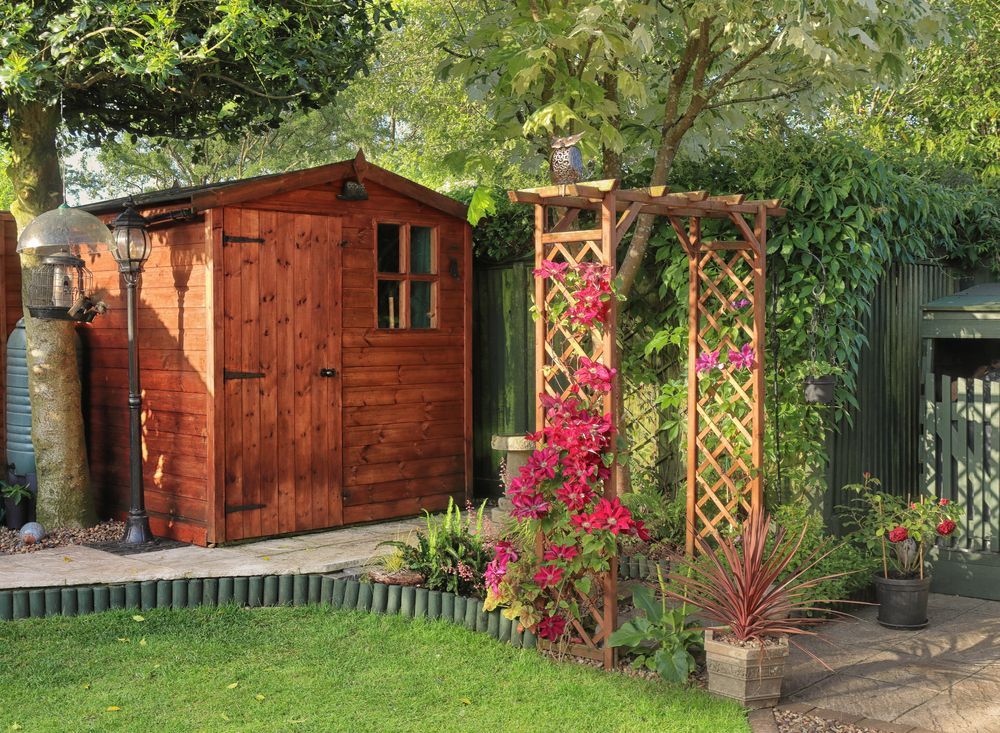 Wooden Shed and Arbor in a Garden — JNR Building And Maintenance in Green Hill, QLD