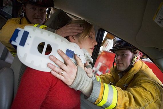 Two firemen helping woman - Attorneys in Neptune, NJ